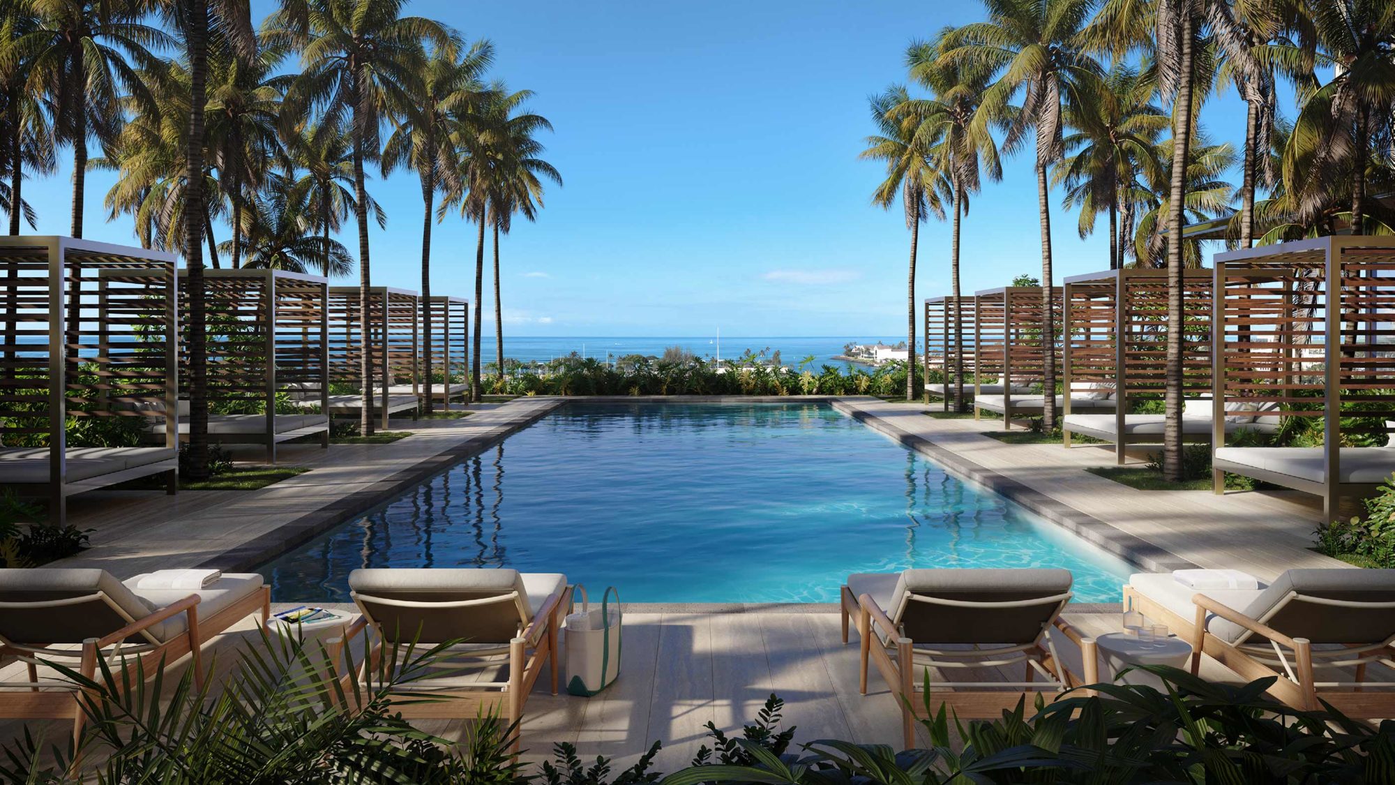 Sunrise Lap Pool surrounded by cabana lounges and palm trees